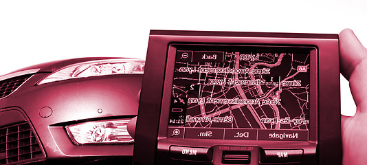 Image showing GPS Vehicle navigation system in a man hand.