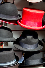 Image showing in london old red hat   fashion shop