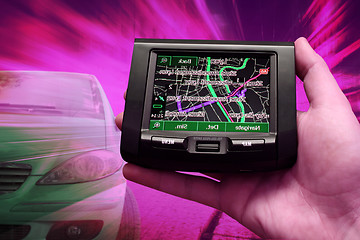 Image showing GPS Vehicle navigation system in a man hand.