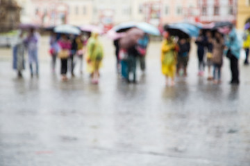 Image showing People with umbrellas