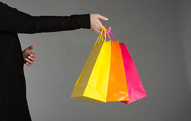 Image showing Holding shopping bags