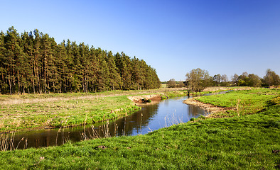 Image showing narrow river in the field  