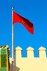 Image showing tunisia  waving flag in the  battlements  wave