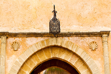 Image showing old door in morocco africa  wall ornate   yellow