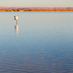 Image showing sunshine in the lake yellow  desert of morocco sand and     dune