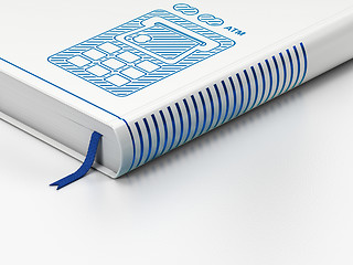 Image showing Money concept: closed book, ATM Machine on white background