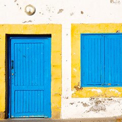 Image showing old door in morocco   yellow window
