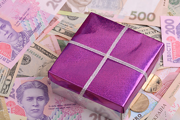 Image showing american money and red gift box, european money