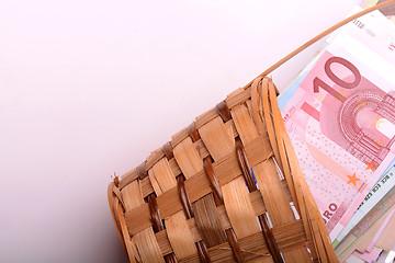 Image showing european money on wooden basket