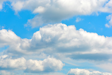 Image showing white fluffy clouds in the blue sky