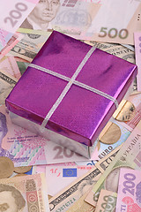 Image showing american money and red gift box, european money