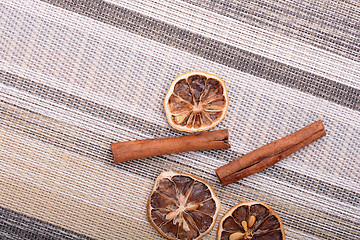 Image showing Slices of fresh dried lemon, orange and spices for cooking or baking