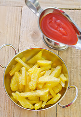 Image showing potato with tomato sauce