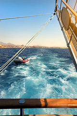 Image showing Sailboat near coastline