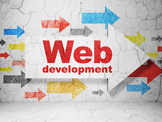 Image showing Web design concept: arrow with Web Development on grunge wall background