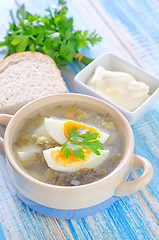 Image showing green soup with boiled eggs