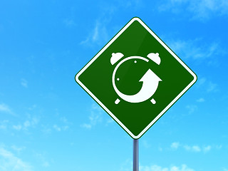 Image showing Timeline concept: Alarm Clock on road sign background