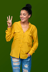 Image showing Woman showing three fingers