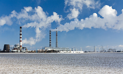 Image showing industrial emissions. winter day.