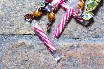 Image showing Candies on a rough plain