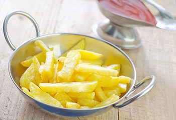 Image showing potato with tomato sauce