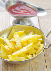 Image showing potato with tomato sauce