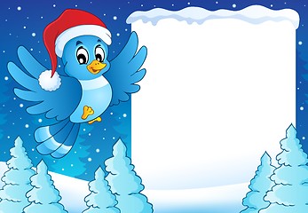 Image showing Frame with bird in Christmas hat