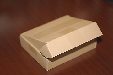 Image showing Cardboard Box on Desk