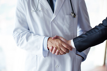 Image showing doctor handshake with a patient