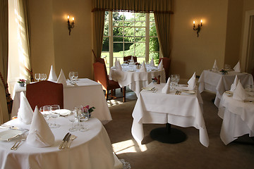 Image showing Hotel Restaurant tables set for service