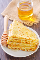 Image showing pancakes with honey