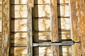 Image showing rusty  brown    morocco in africa  wood  facade and safe padlock