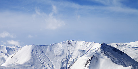 Image showing Panoramic view on snowy mountains with avalanches