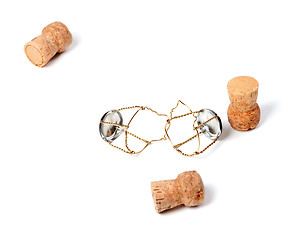 Image showing Three corks from champagne wine and muselets