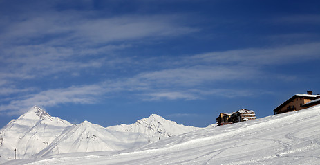 Image showing Panoramic view on ski slope and hotels in winter mountains