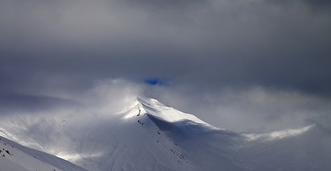 Image showing Panoramic view on off-piste slope in storm clouds