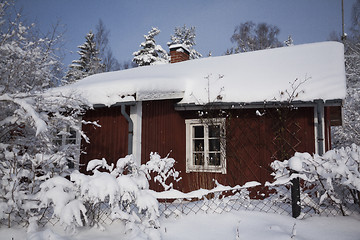 Image showing red cottage in winter