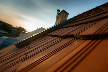 Image showing Roof tile over blue sky