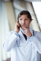 Image showing doctor speaking on cellphone