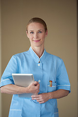 Image showing female doctor with tablet computer