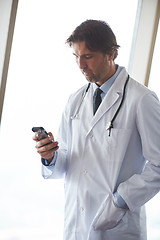 Image showing doctor speaking on cellphone