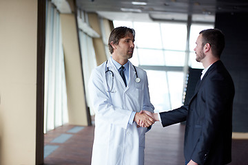 Image showing doctor handshake with a patient