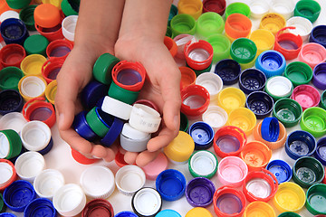 Image showing collecting of color pet caps 