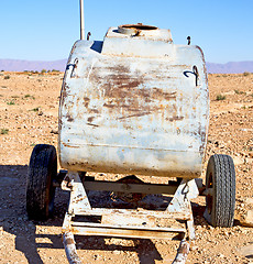 Image showing water tank in morocco africa land gray  metal weel and arid