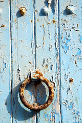 Image showing rusty metal      in the blue wood door and morocco  