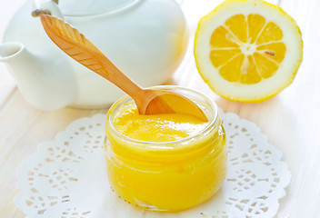 Image showing honey and lemons