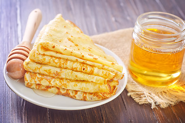 Image showing pancakes with honey