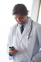 Image showing doctor speaking on cellphone