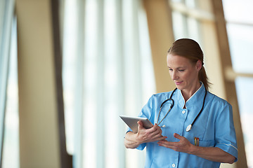 Image showing female doctor with tablet computer