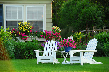 Image showing Two lawn chairs